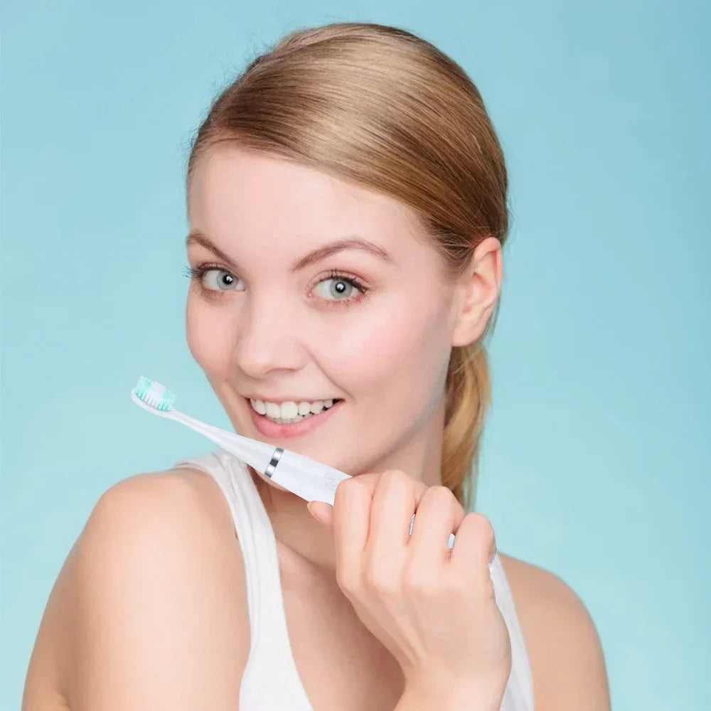 Ottieni denti più puliti e più sani con un gesto
